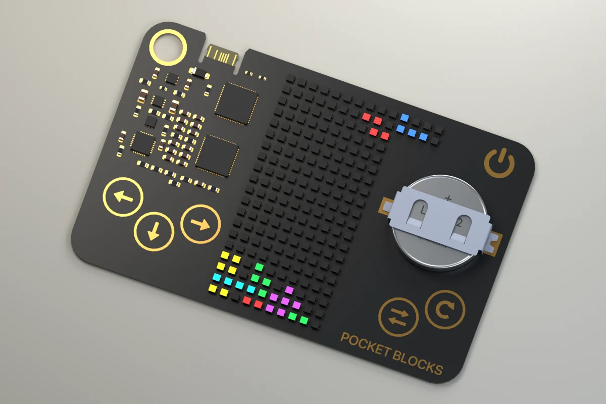 Landscape black PCB with rounded corners and gold lanyard ring
